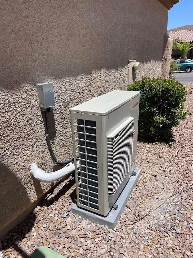 Residential air conditioning condenser unit in Glenwood